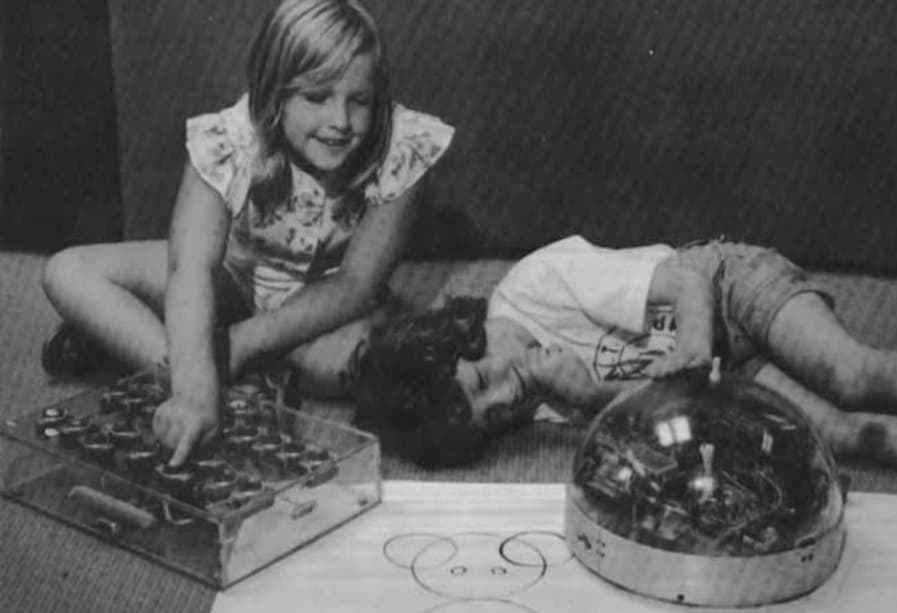 A photo from Seymour Papert’s “Mindstorms,” showing children thinking of learning as play. Image from Khan Academy.